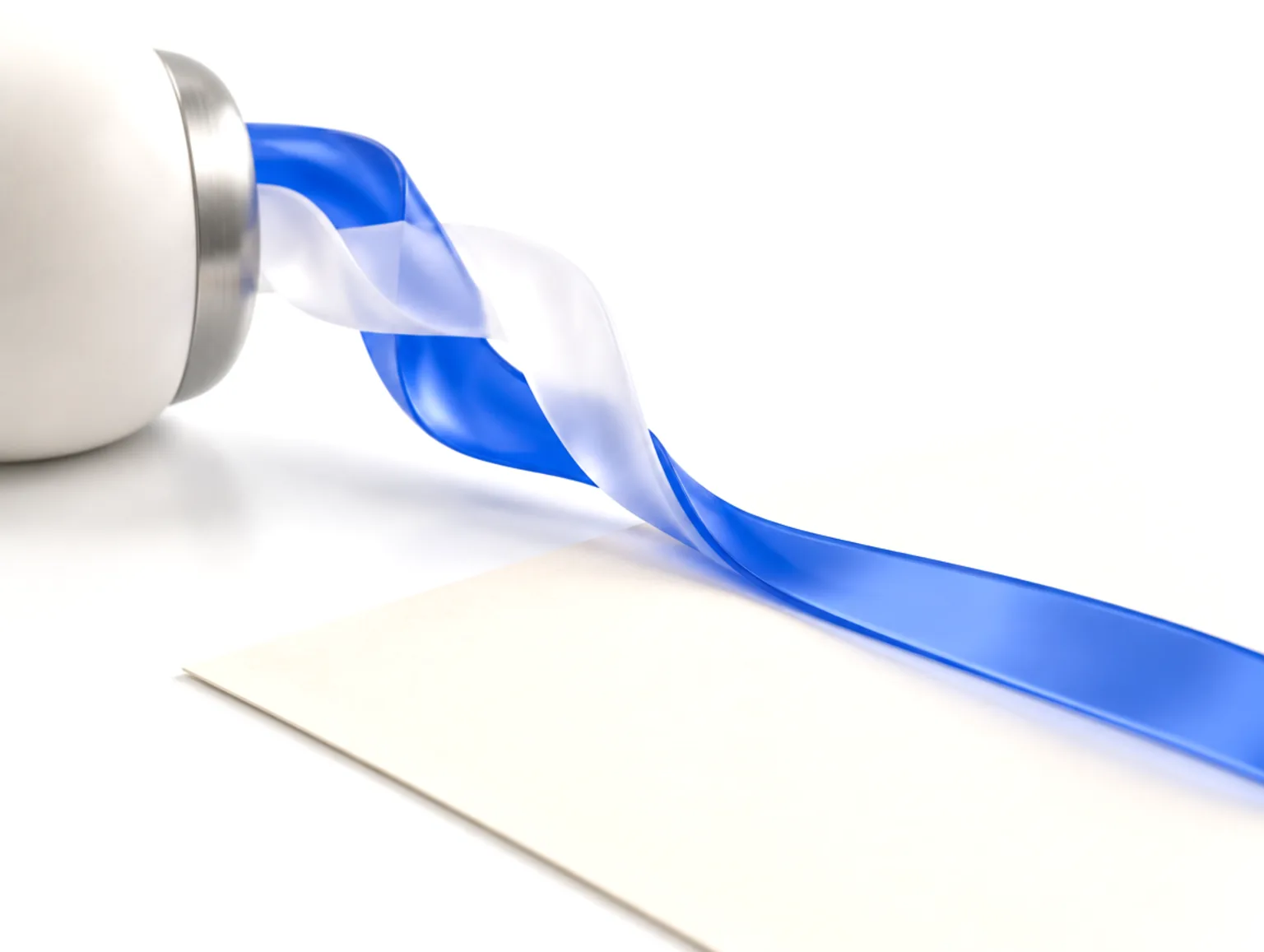 Two ribbons of glass, one blue and one frosted white, braiding into a single blue ribbon that lays onto a sheet of paper
